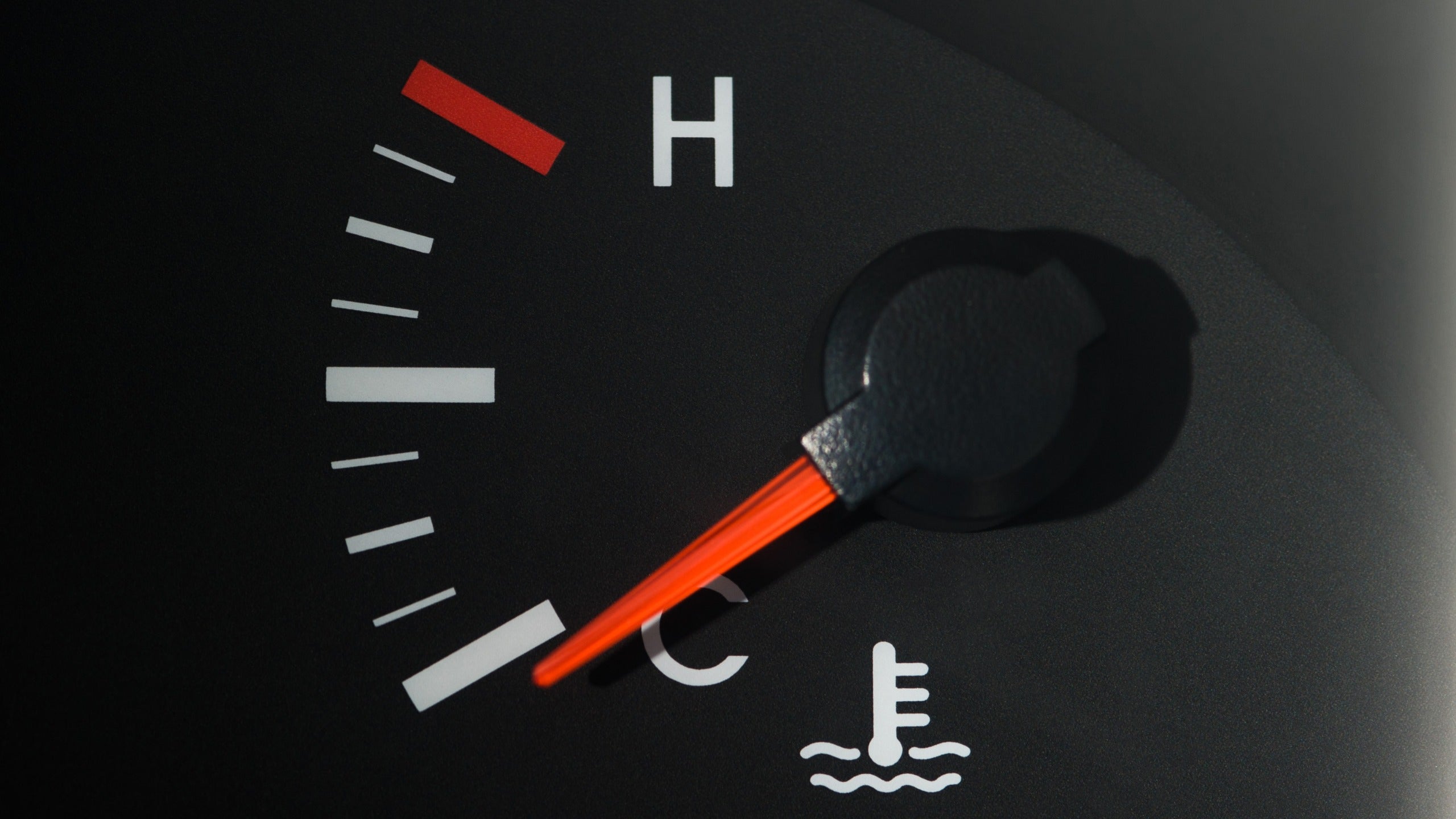 A photograph of the Engine Temperature Gauge on a vehicle's dashboard