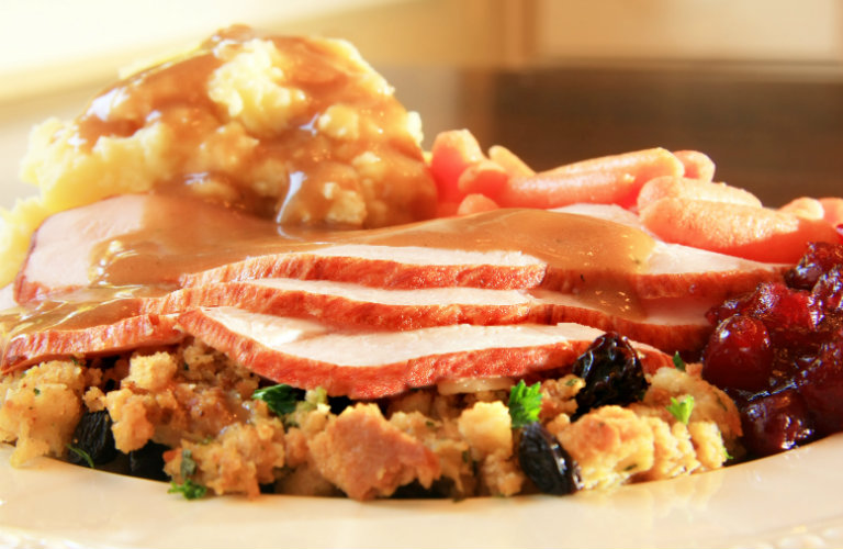 Plate-filled-with-turkey-mashed-potatoes-and-other-Thanksgiving-foods