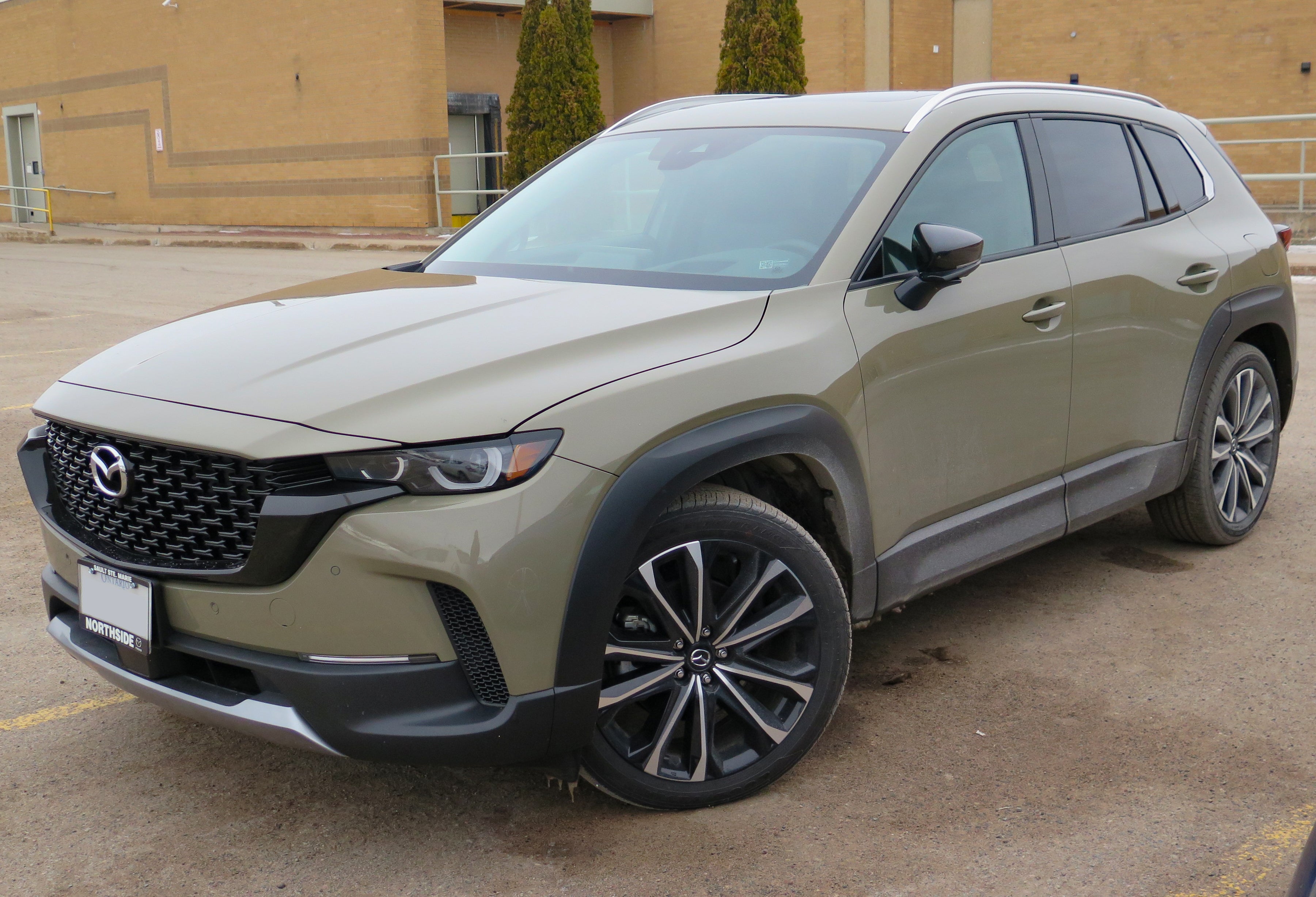 The 2025 Mazda CX-50 in Zircon Sand Metallic color.