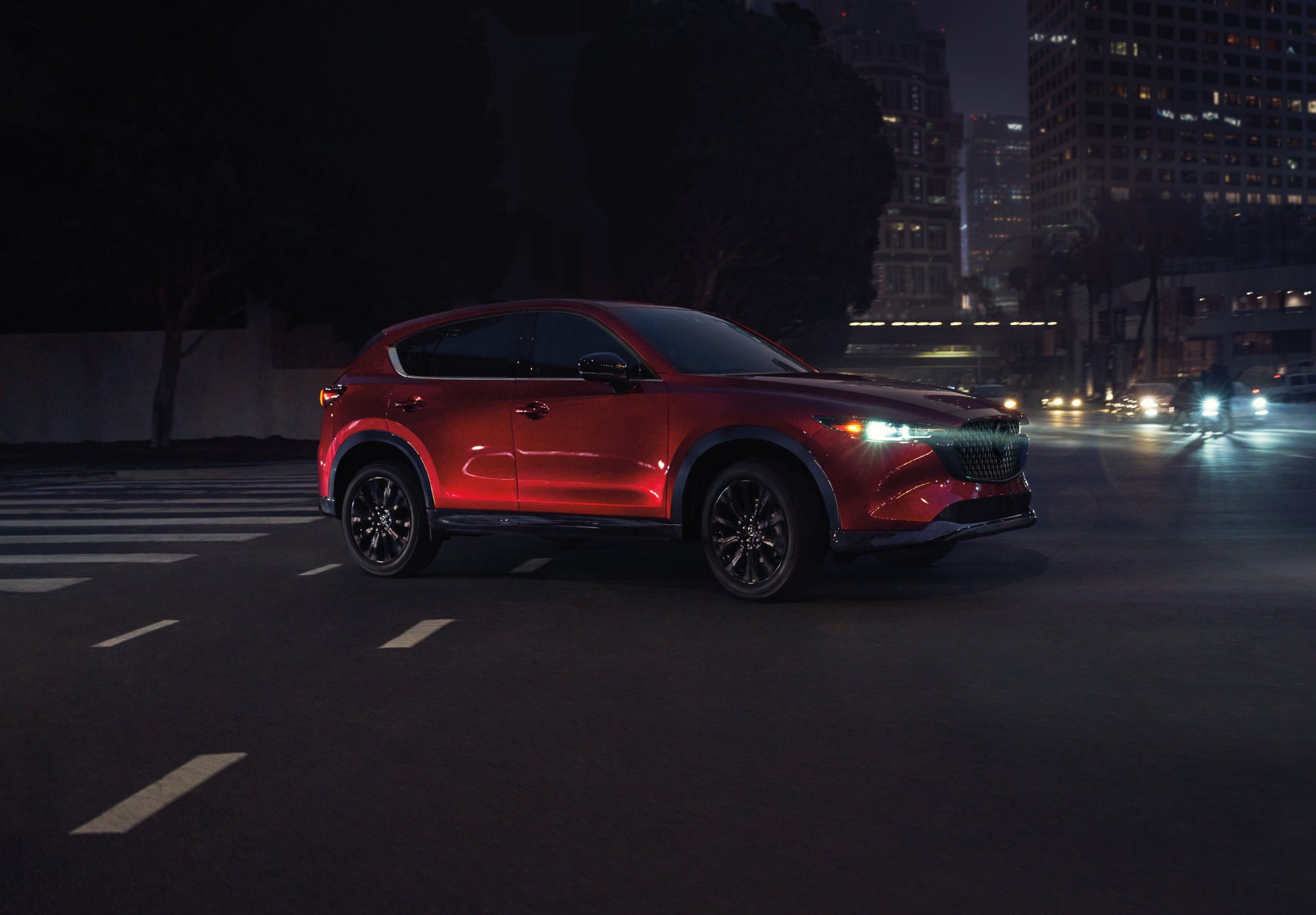 The 2025 Mazda CX-5 with a red exterior